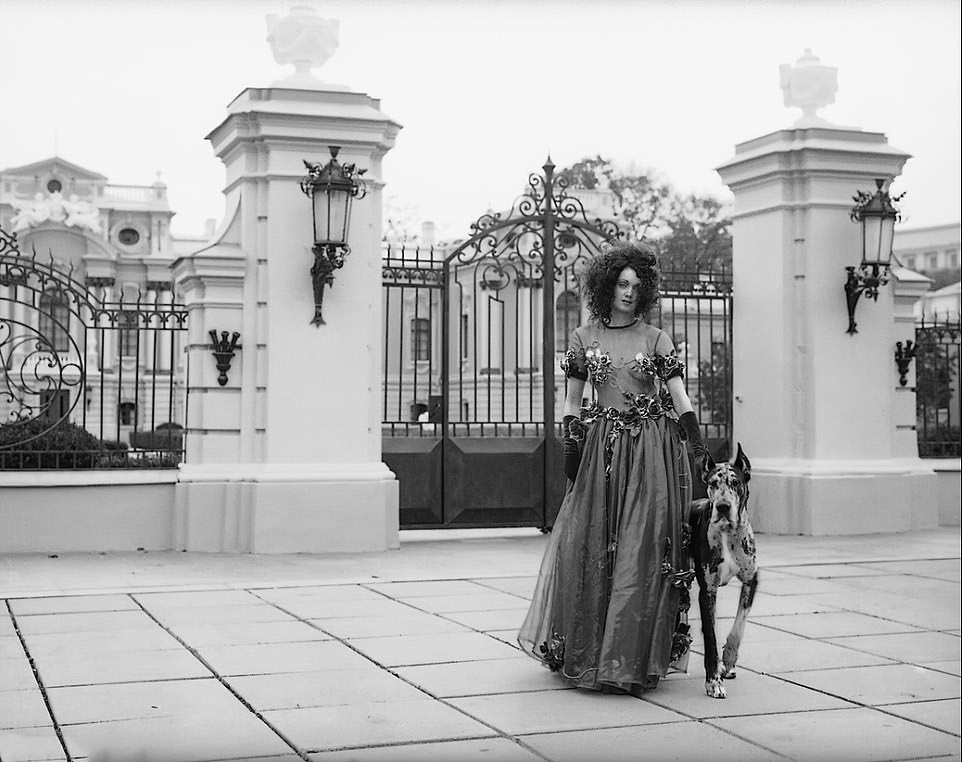 Mariinskyi Palace: Woman and dog pose in front of the historic palace, 1998.