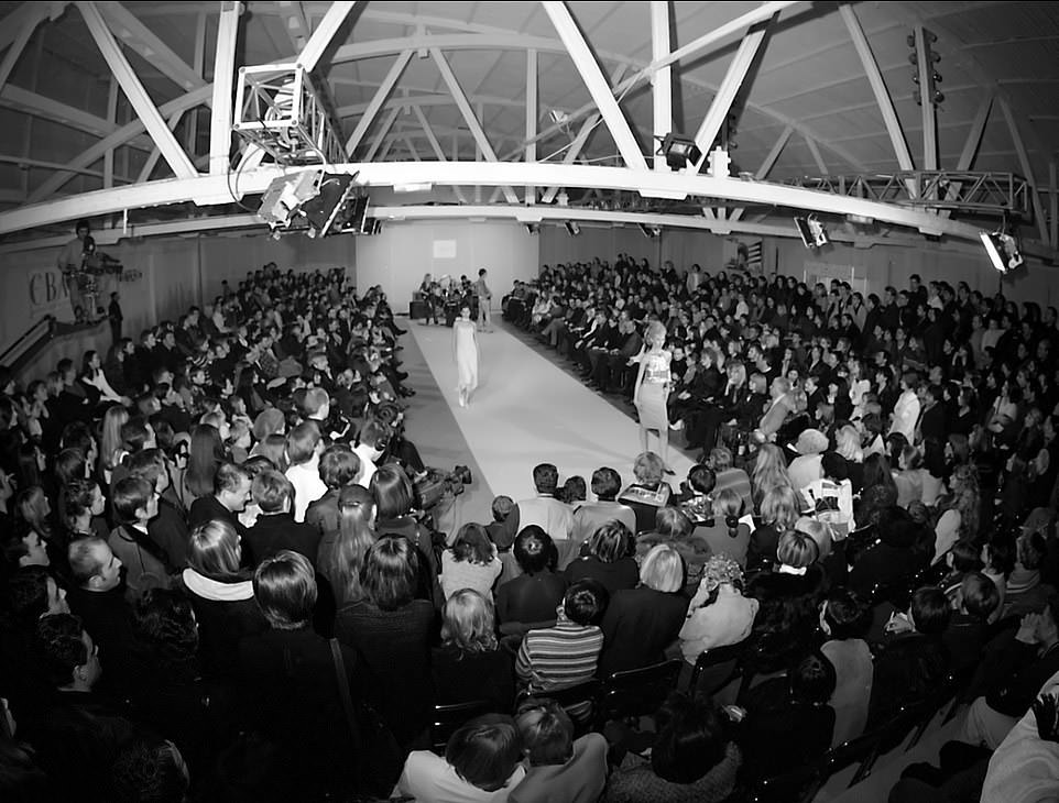 Fashion Show: Models walk the catwalk as press captures the moment