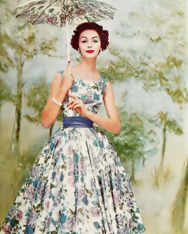 Lucinda Hollingsworth in a warp print dress with a simple bodice and circular skirt, 1957.
