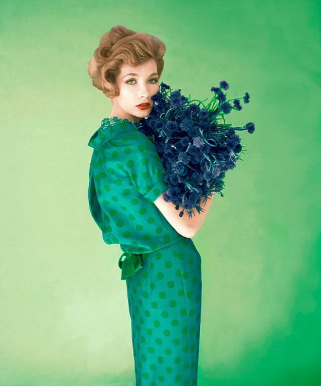 Jessica Ford in a blue silk dress with green polka dots by Dan Keller, 1958.