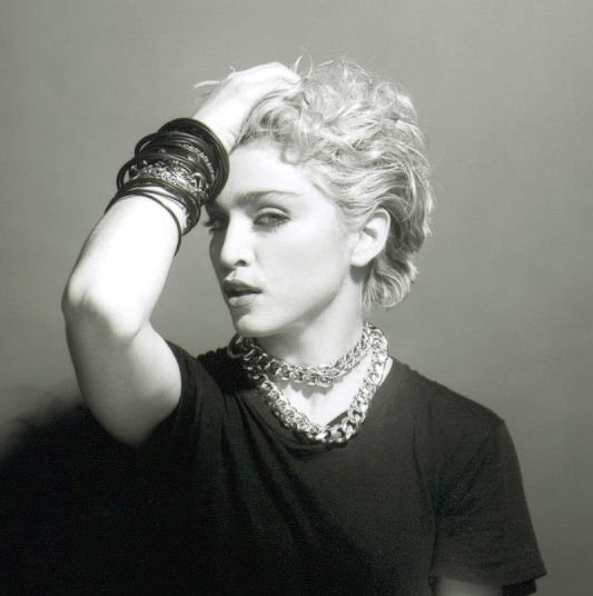 A Belly Button, Platinum Hair, and Pop Stardom: Diving Deep into Madonna's Iconic Debut Album Photoshoot