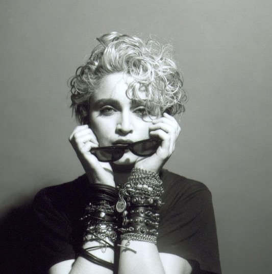 A Belly Button, Platinum Hair, and Pop Stardom: Diving Deep into Madonna's Iconic Debut Album Photoshoot