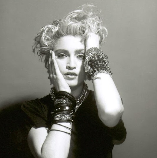 A Belly Button, Platinum Hair, and Pop Stardom: Diving Deep into Madonna's Iconic Debut Album Photoshoot