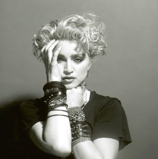 A Belly Button, Platinum Hair, and Pop Stardom: Diving Deep into Madonna's Iconic Debut Album Photoshoot