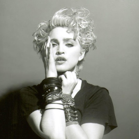 A Belly Button, Platinum Hair, and Pop Stardom: Diving Deep into Madonna's Iconic Debut Album Photoshoot