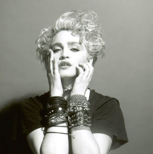 A Belly Button, Platinum Hair, and Pop Stardom: Diving Deep into Madonna's Iconic Debut Album Photoshoot