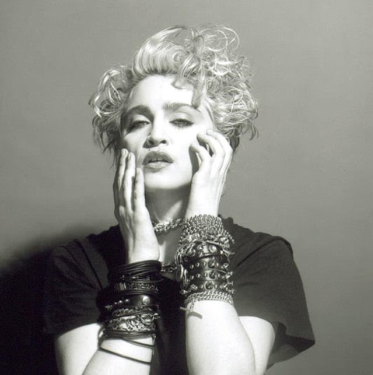 A Belly Button, Platinum Hair, and Pop Stardom: Diving Deep into Madonna's Iconic Debut Album Photoshoot