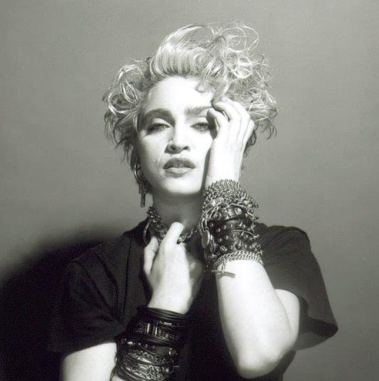 A Belly Button, Platinum Hair, and Pop Stardom: Diving Deep into Madonna's Iconic Debut Album Photoshoot