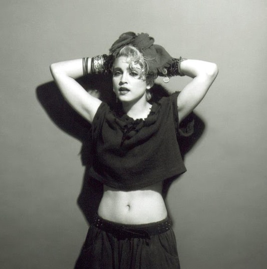 A Belly Button, Platinum Hair, and Pop Stardom: Diving Deep into Madonna's Iconic Debut Album Photoshoot