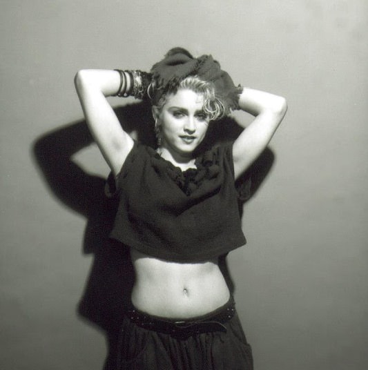 A Belly Button, Platinum Hair, and Pop Stardom: Diving Deep into Madonna's Iconic Debut Album Photoshoot