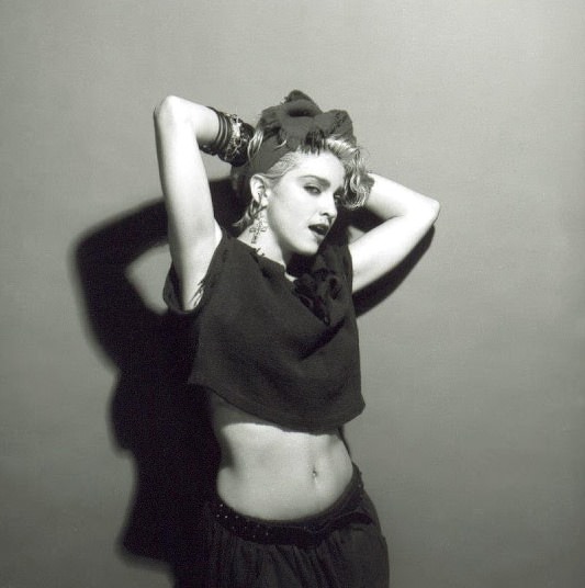 A Belly Button, Platinum Hair, and Pop Stardom: Diving Deep into Madonna's Iconic Debut Album Photoshoot