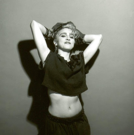 A Belly Button, Platinum Hair, and Pop Stardom: Diving Deep into Madonna's Iconic Debut Album Photoshoot