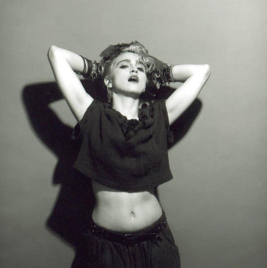 A Belly Button, Platinum Hair, and Pop Stardom: Diving Deep into Madonna's Iconic Debut Album Photoshoot