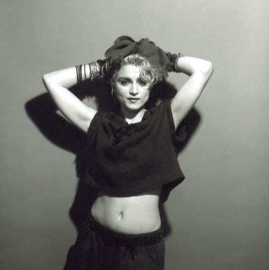 A Belly Button, Platinum Hair, and Pop Stardom: Diving Deep into Madonna's Iconic Debut Album Photoshoot