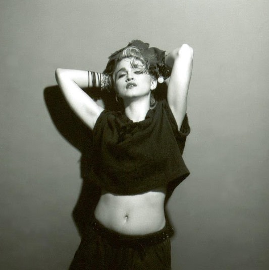 A Belly Button, Platinum Hair, and Pop Stardom: Diving Deep into Madonna's Iconic Debut Album Photoshoot