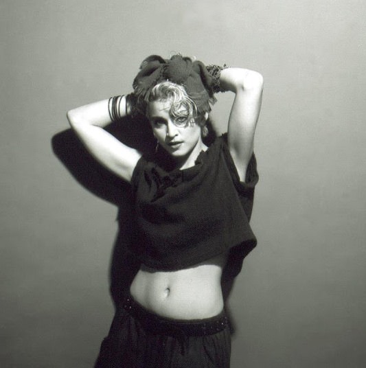 A Belly Button, Platinum Hair, and Pop Stardom: Diving Deep into Madonna's Iconic Debut Album Photoshoot