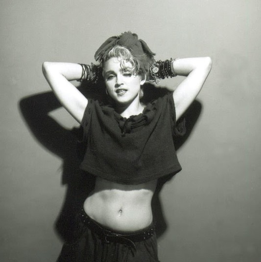 A Belly Button, Platinum Hair, and Pop Stardom: Diving Deep into Madonna's Iconic Debut Album Photoshoot