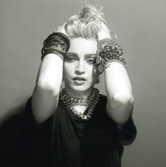 A Belly Button, Platinum Hair, and Pop Stardom: Diving Deep into Madonna's Iconic Debut Album Photoshoot