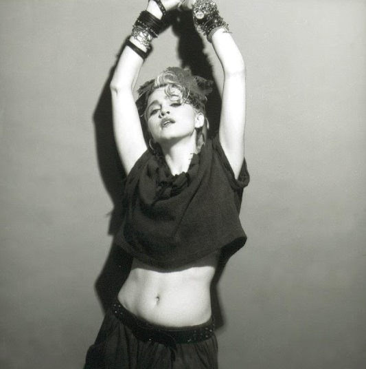 A Belly Button, Platinum Hair, and Pop Stardom: Diving Deep into Madonna's Iconic Debut Album Photoshoot