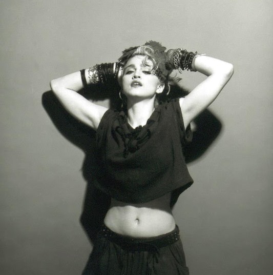 A Belly Button, Platinum Hair, and Pop Stardom: Diving Deep into Madonna's Iconic Debut Album Photoshoot