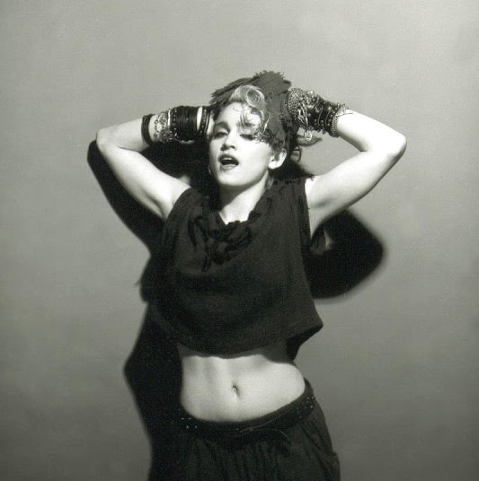 A Belly Button, Platinum Hair, and Pop Stardom: Diving Deep into Madonna's Iconic Debut Album Photoshoot