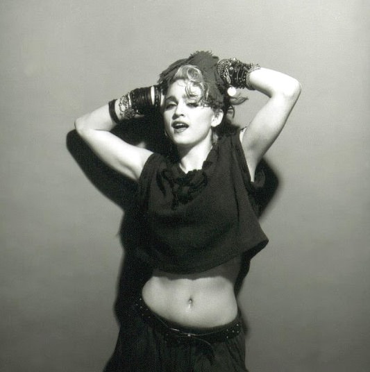 A Belly Button, Platinum Hair, and Pop Stardom: Diving Deep into Madonna's Iconic Debut Album Photoshoot