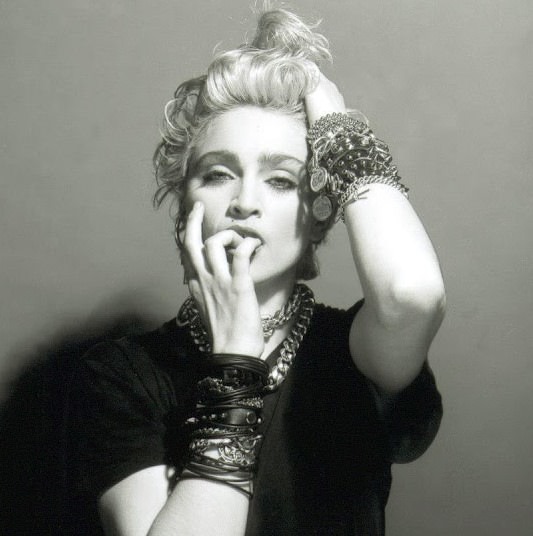 A Belly Button, Platinum Hair, and Pop Stardom: Diving Deep into Madonna's Iconic Debut Album Photoshoot