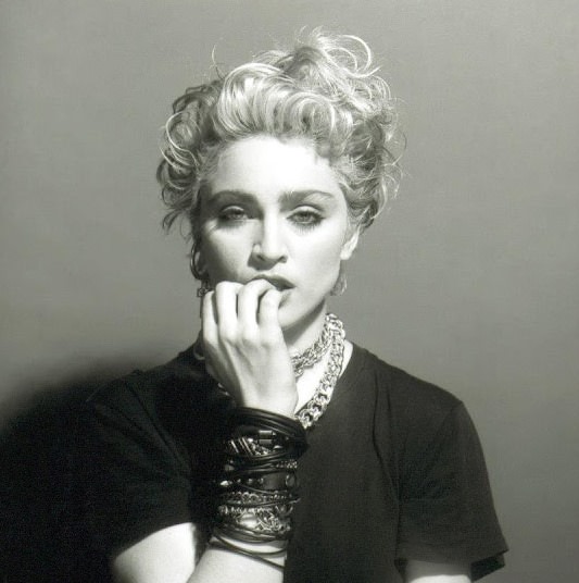 A Belly Button, Platinum Hair, and Pop Stardom: Diving Deep into Madonna's Iconic Debut Album Photoshoot