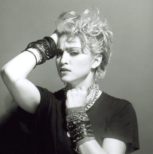 A Belly Button, Platinum Hair, and Pop Stardom: Diving Deep into Madonna's Iconic Debut Album Photoshoot