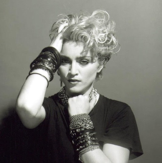 A Belly Button, Platinum Hair, and Pop Stardom: Diving Deep into Madonna's Iconic Debut Album Photoshoot