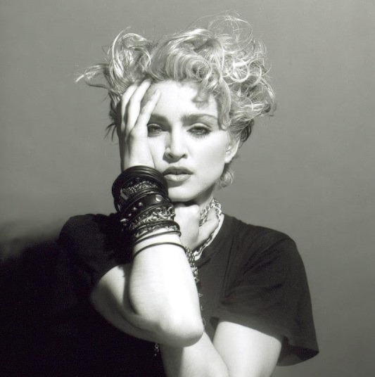 A Belly Button, Platinum Hair, and Pop Stardom: Diving Deep into Madonna's Iconic Debut Album Photoshoot