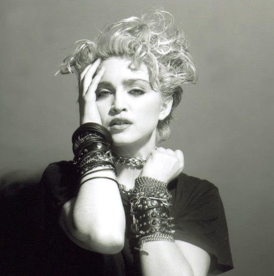 A Belly Button, Platinum Hair, and Pop Stardom: Diving Deep into Madonna's Iconic Debut Album Photoshoot