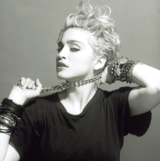 A Belly Button, Platinum Hair, and Pop Stardom: Diving Deep into Madonna's Iconic Debut Album Photoshoot