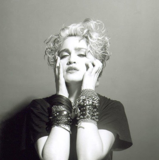 A Belly Button, Platinum Hair, and Pop Stardom: Diving Deep into Madonna's Iconic Debut Album Photoshoot