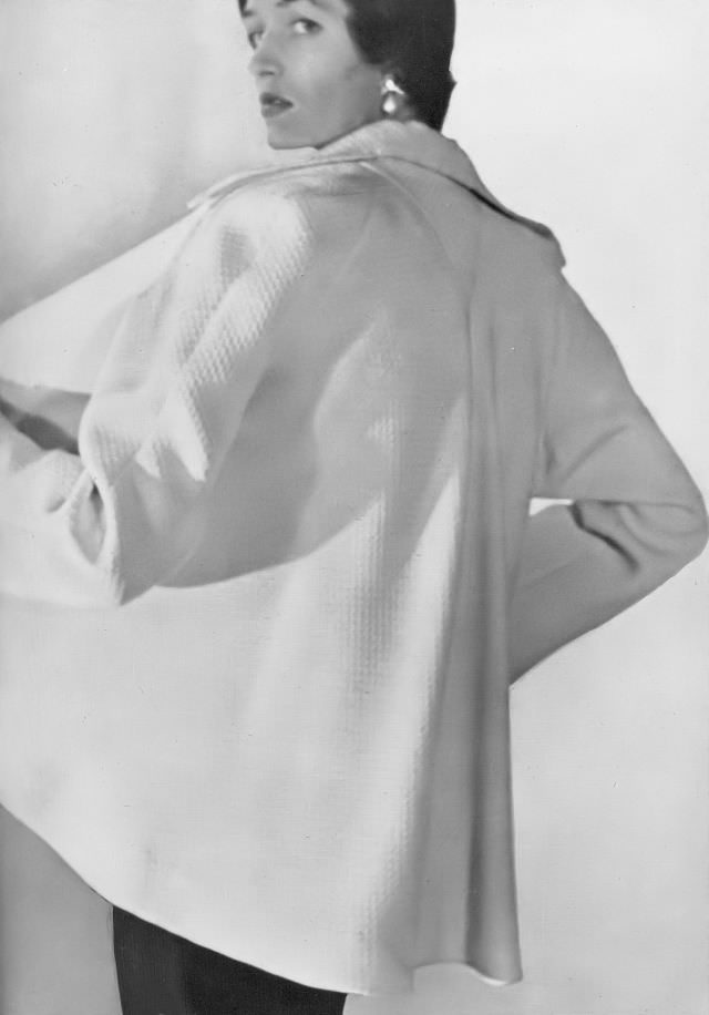 Maxime de la Falaise in a white piqué evening coat by Mark Luker of Jay's, 1949.