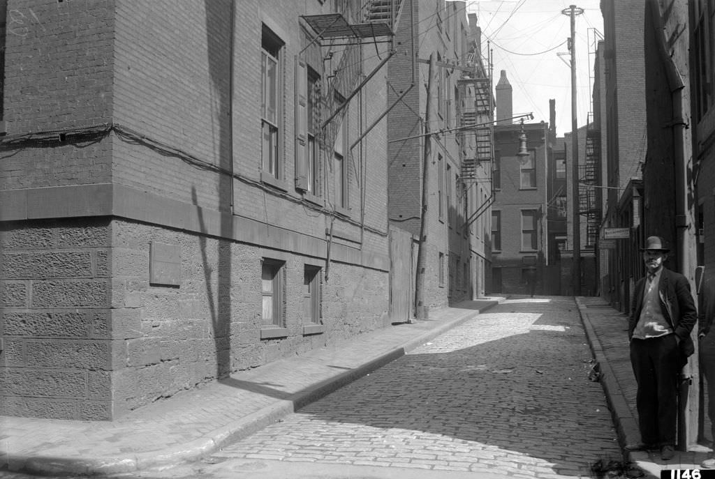 Lemon Alley, man looking east from Cherry Way, 1910s