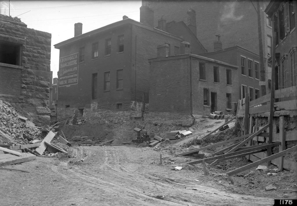 Dante and Webster, corner in Hump District during "hump" cut project, 1912
