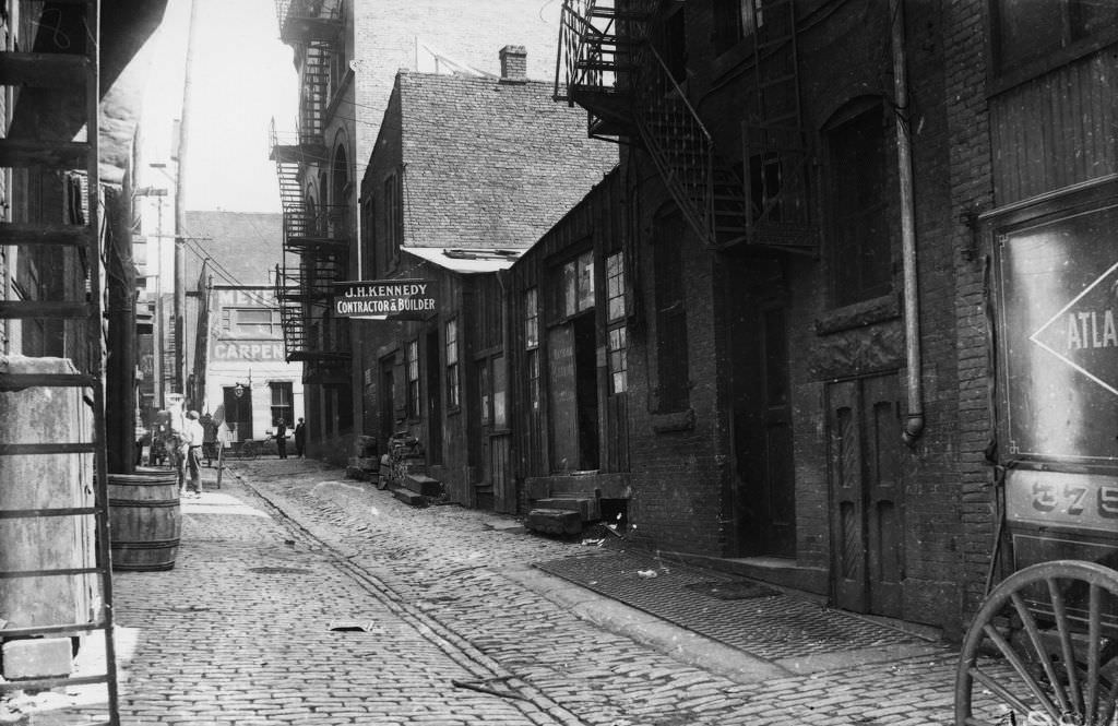 Lemon Alley, cobblestone street and J.H. Kennedy offices, 1912