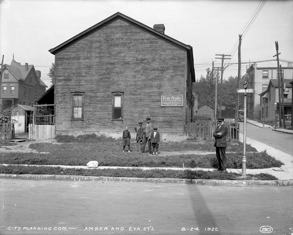 Boys play horseshoes, house for sale at Amber and Eva, 1920.