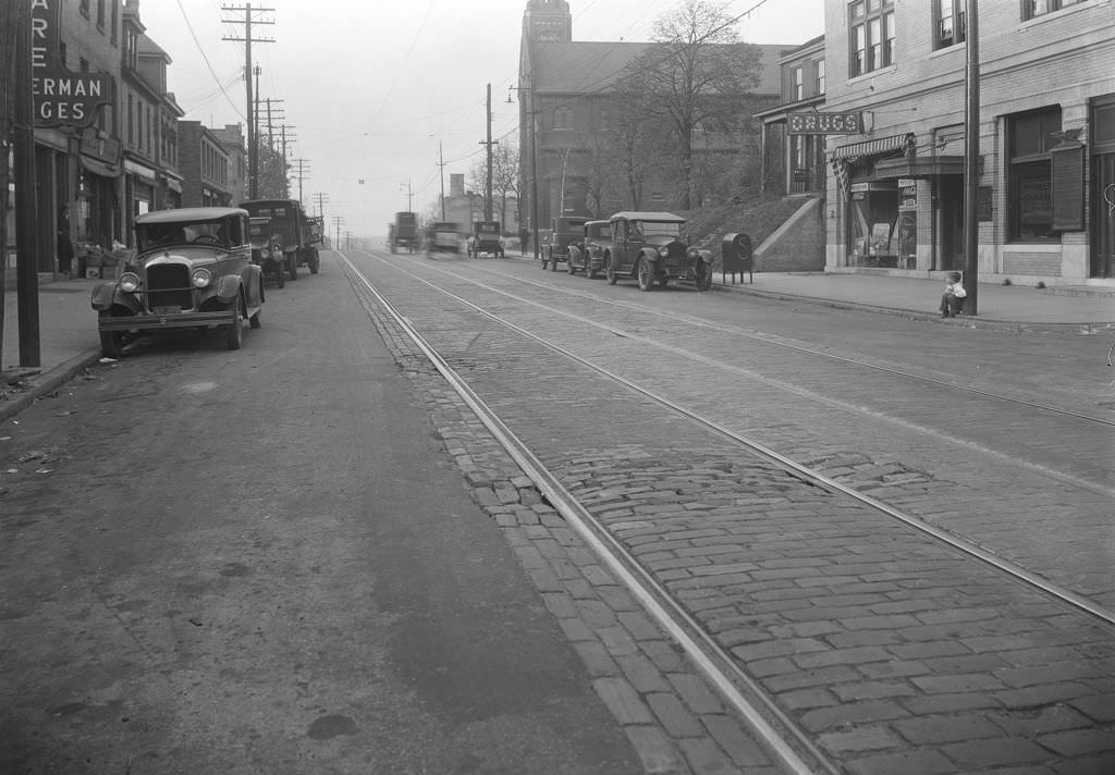 Brownsville Road in Carrick with drug store and boy on curb, 1927.