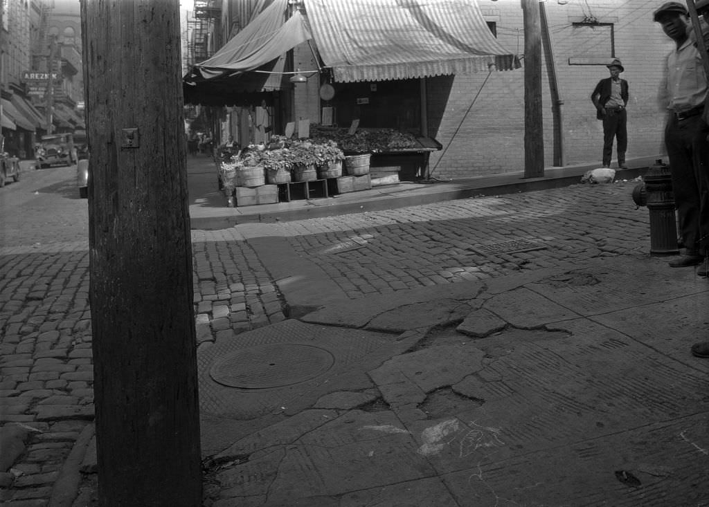 Logan Street, Southeast corner at Logan and Clark Streets showing a produce store, 1933.