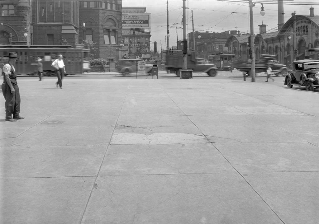 East Ohio Street, In front of public comfort station looking east, 1931.