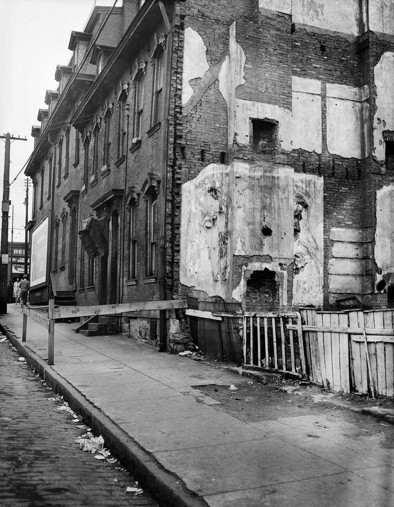 Vacant Lot Next to a Brick Row House, Hill District, 1945