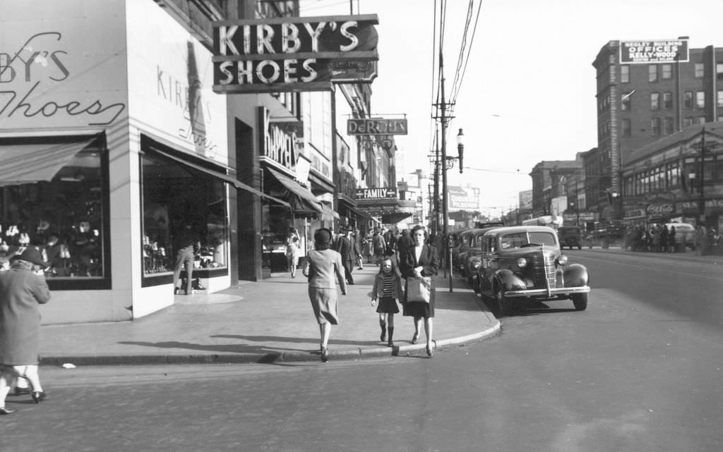 Kirby's Shoes at 6101 Penn Avenue looking east showing pedestrians and the Negley Building, 1945