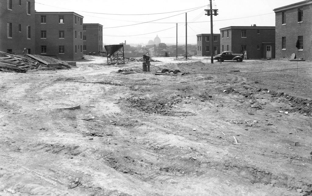 A view of the lower level of Bedford Dwellings, looking west, showcasing construction progress, 1940