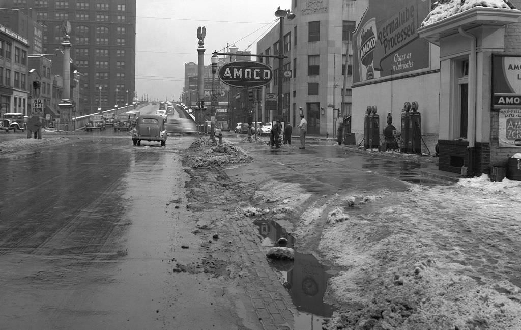 Snow Removal at the Amoco Station, Boulevard of the Allies and Grant Street looking east at 3:25 p.m., 1941