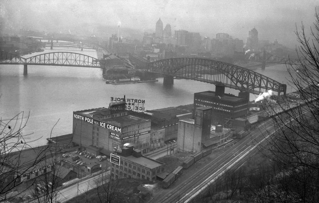 General view of the Fort Pitt exploration area from Duquesne Heights near North Pole Ice Cream and Breakfast Cheer Coffee, 1942