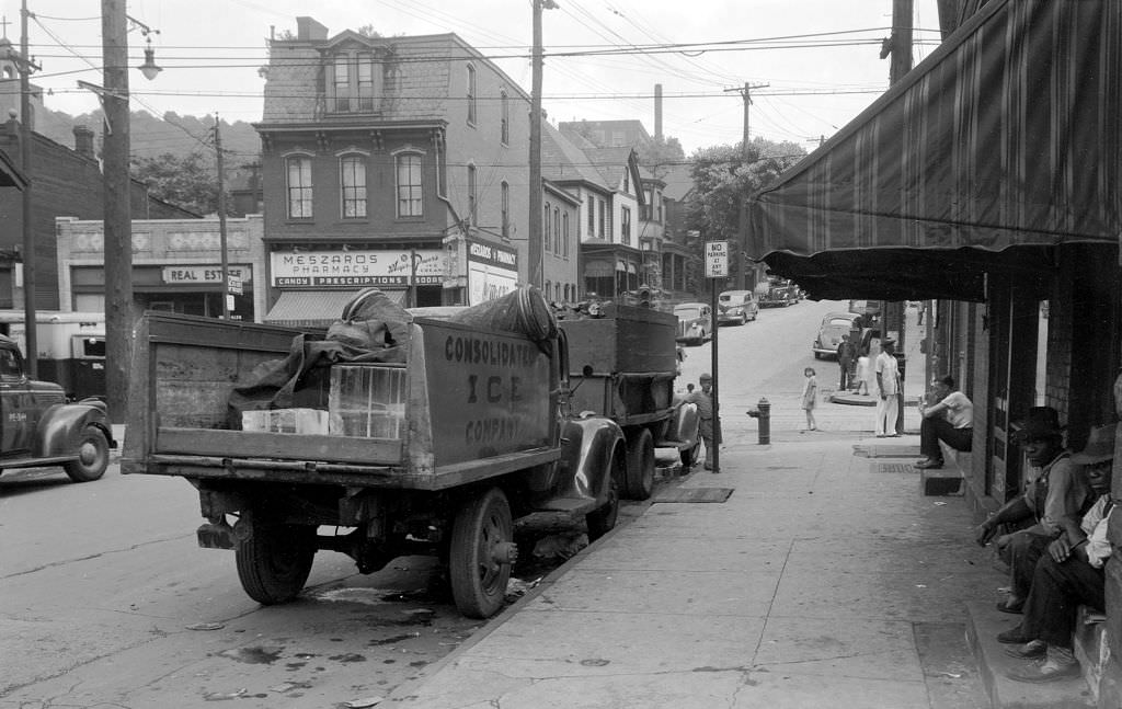 Hazelwood Avenue looking northeast from railroad tracks showing Meszaros Pharmacy, 1943