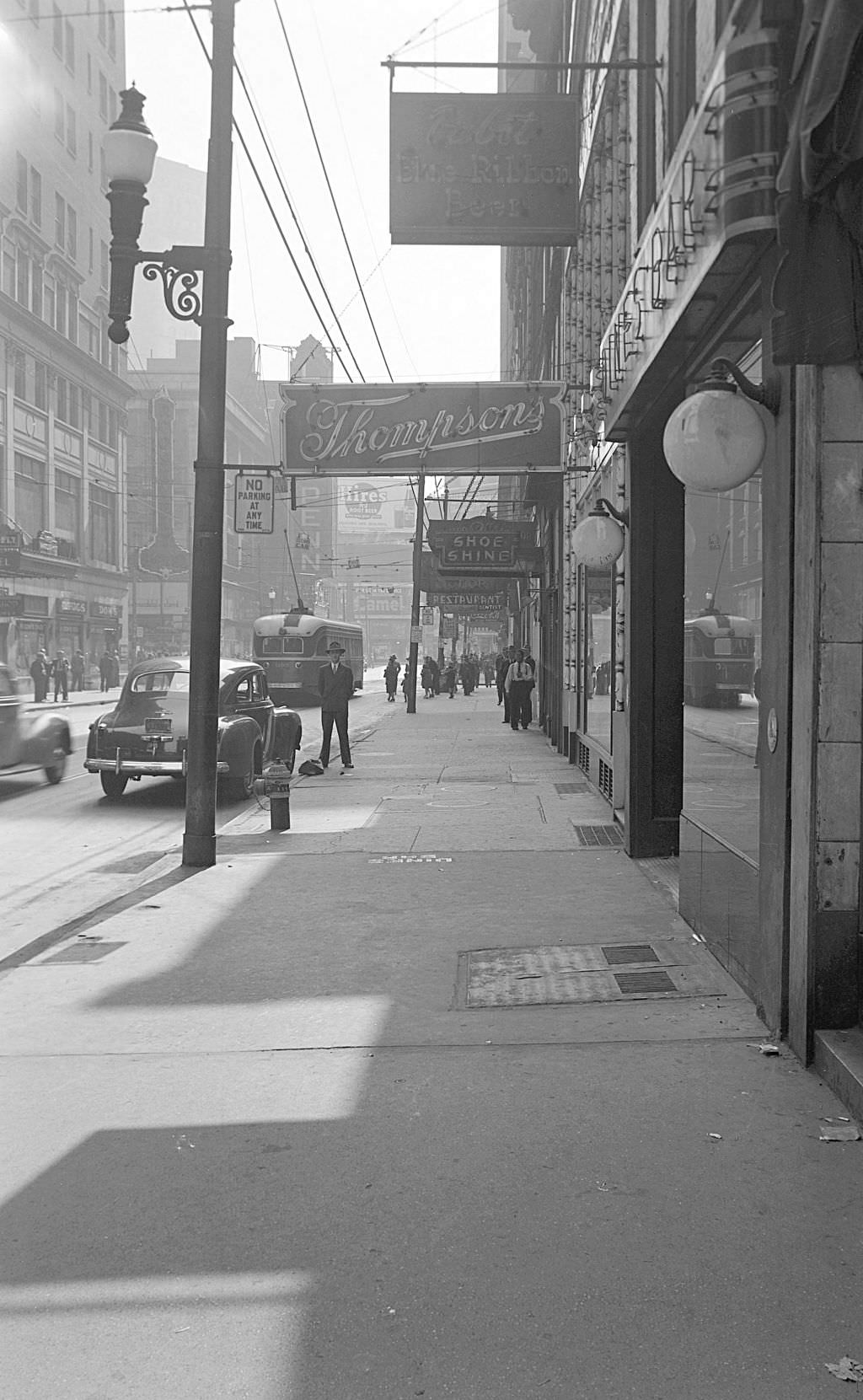 View of Thompson's Store and Dines Bar on Sixth Street, 1945.