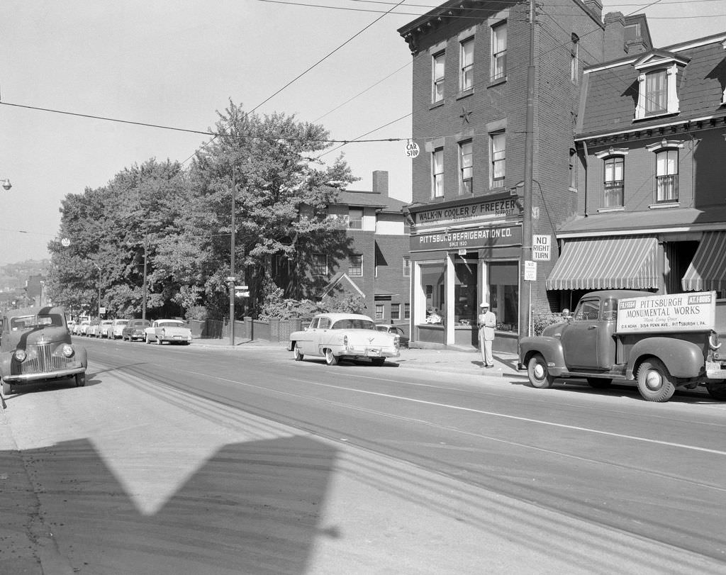 Man in front of Pittsburgh Refrigeration Company at Penn and 38th Street, 1957